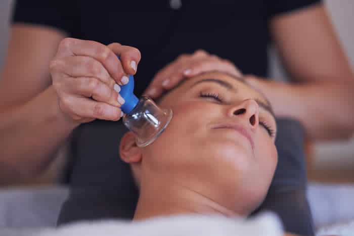 Massage therapists should know all possible cautions and contraindications before performing facial cupping on clients.
